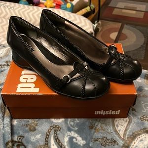 Unlisted wedge shoe/heel